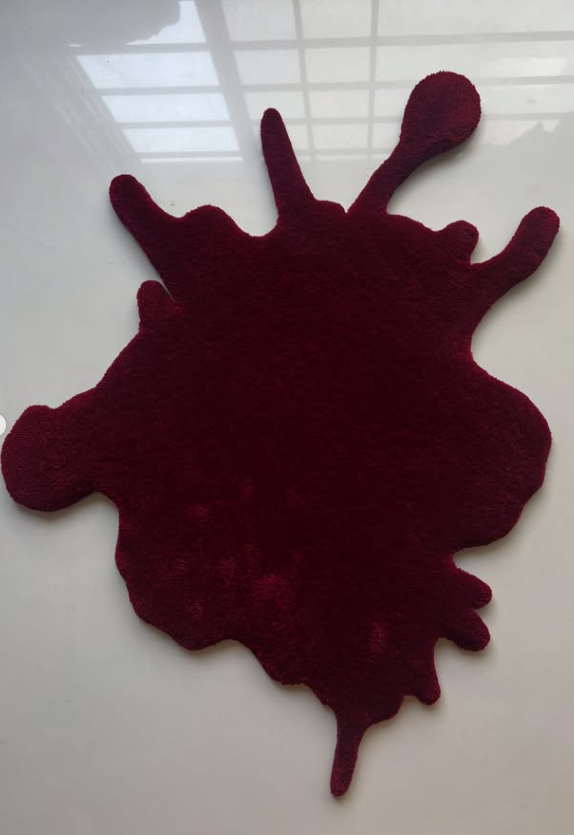 Handmade Blood Splash red tufted rug detail